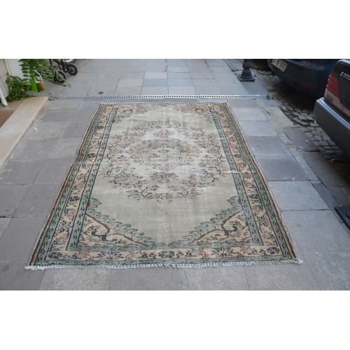 Green and Beige Faded Rug