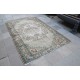 Green and Beige Faded Rug