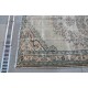 Green and Beige Faded Rug